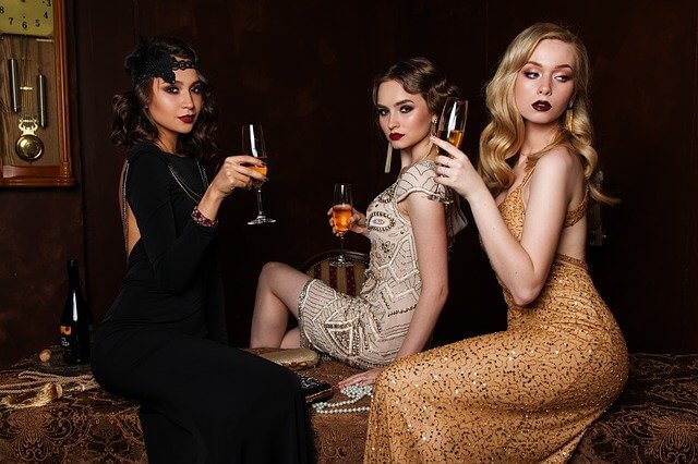Three beautiful women standing together