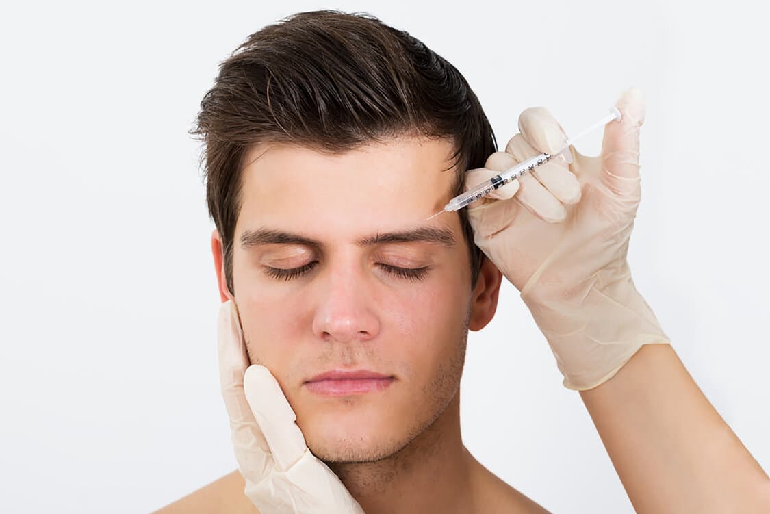man getting botox for wrinkles