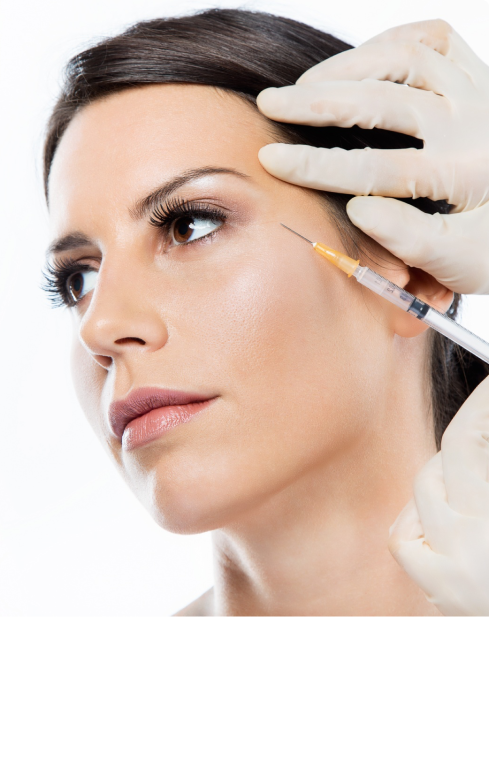 A woman having an injection for a botox wrinkle relaxing treatment.