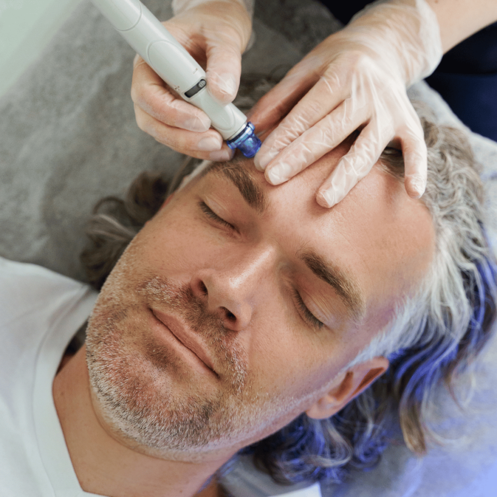 Middle Aged Man during Deep Facial Cleansing with hydrafacial