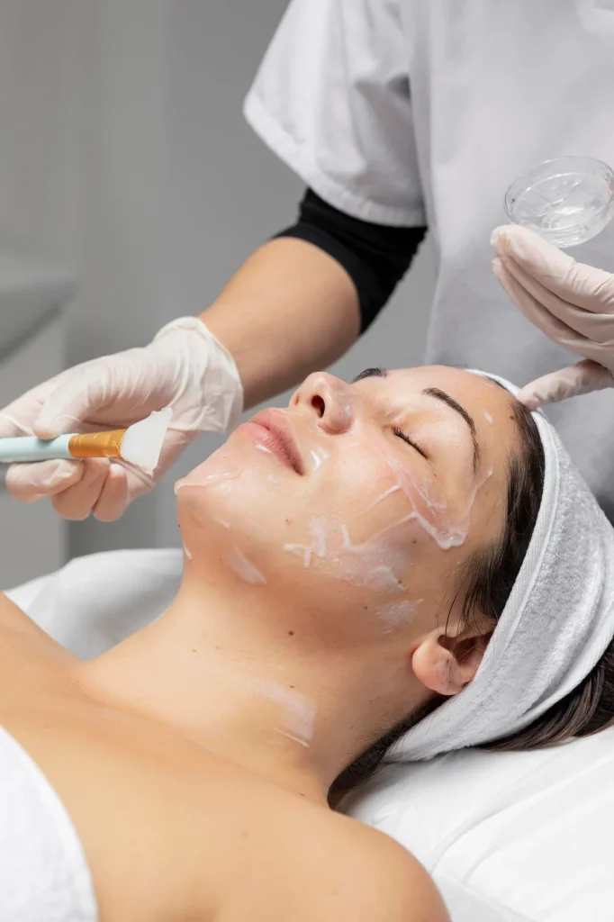 A woman has a chemical peel treatment.